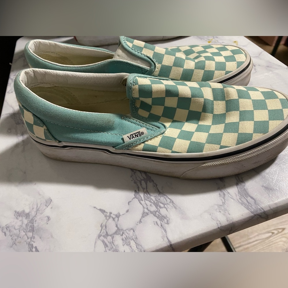 Teal and white checkered slip on vans